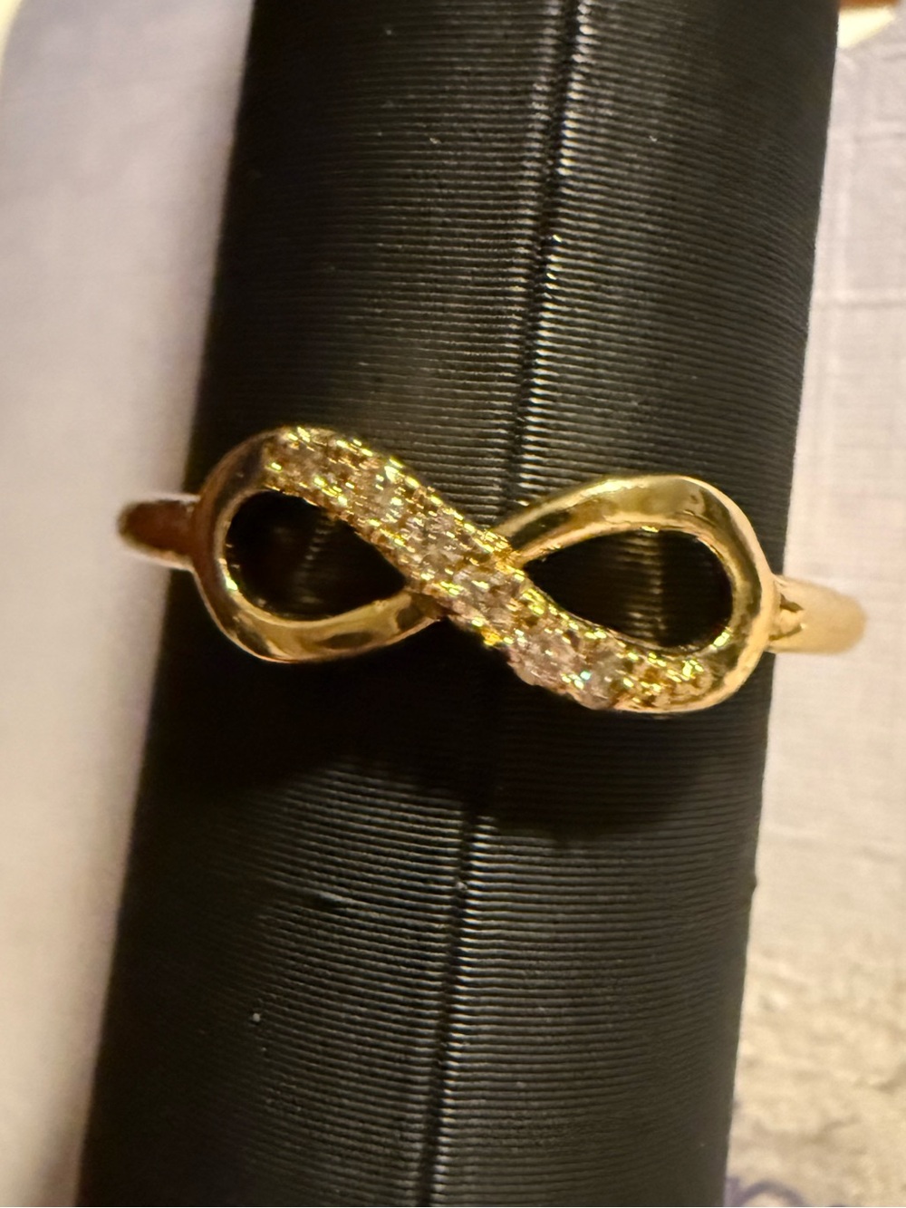Delicate Gold Tone Infinity Ring with Sparkling Accents